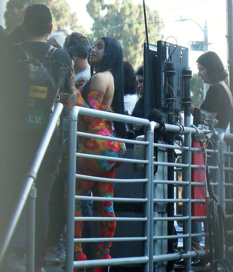 Cardi B boobs and booty on display on and off stage showing nice cleavage and her sexy ass in a tight dress.























