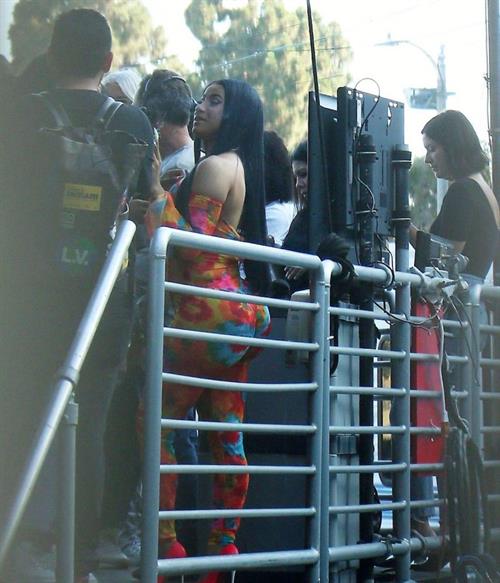 Cardi B Pictures Cardi B boobs and booty on display on and off stage showing nice cleavage and her sexy ass in a tight dress.