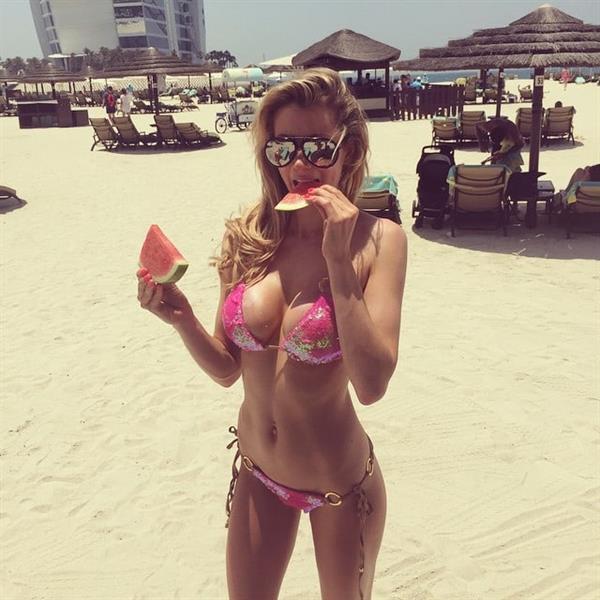 Olivia Attwood in a bikini taking a selfie