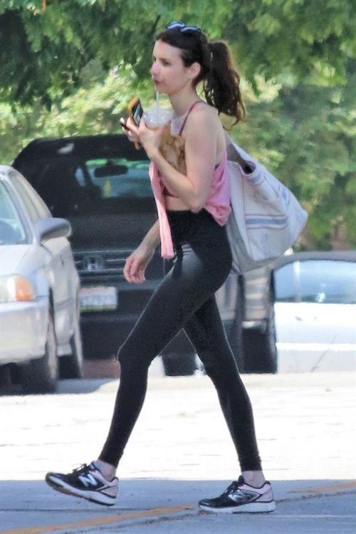 Emma Roberts Pictures Emma Roberts sexy little ass and thigh gap in tight pants seen by paparazzi with Garrett Hedlund.