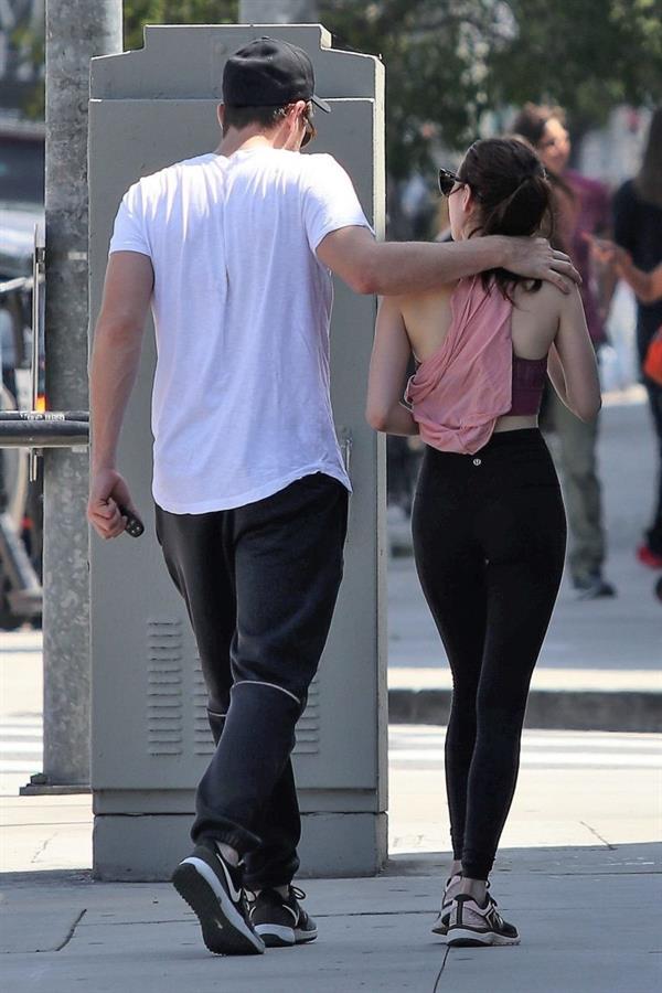 Emma Roberts sexy little ass and thigh gap in tight pants seen by paparazzi with Garrett Hedlund.



