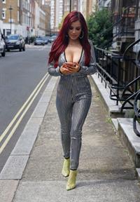 Carla Howe braless boobs showing nice cleavage in London.




