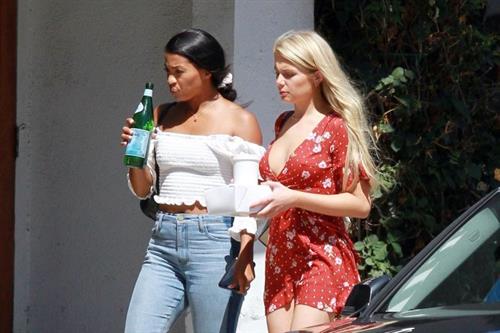 Demi Burnett braless boobs in a low cut dress showing nice cleavage seen by paparazzi.






