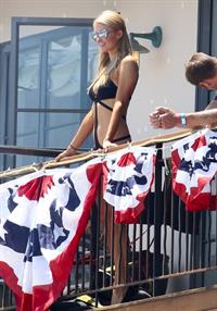 Paris Hilton on a balcony