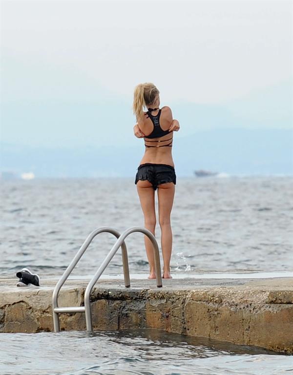 Kimberley Garner at the beach with her dog