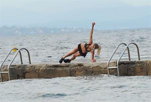 Kimberley Garner at the beach with her dog