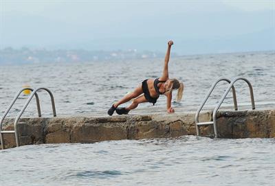 Kimberley Garner at the beach with her dog