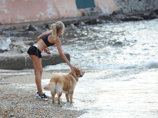 Kimberley Garner at the beach with her dog