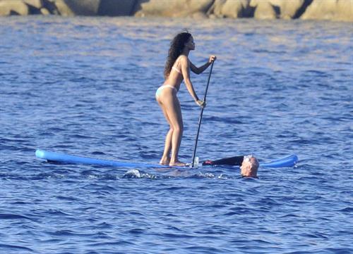 Rihanna paddle boarding