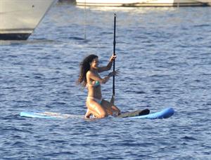 Rihanna paddle boarding