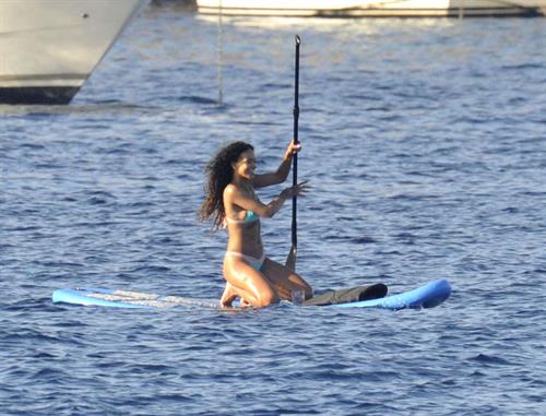Rihanna paddle boarding