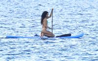 Rihanna paddle boarding