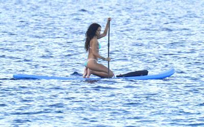 Rihanna paddle boarding