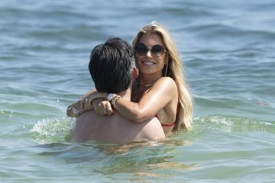 Sylvie Meis sexy ass in a bikini at the beach with her new boyfriend at the beach seen by paparazzi.















