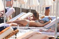 Maggie Q sexy ass in a thong bikini at the beach seen by paparazzi. 




























