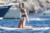 Cara Santana sexy ass in a thong bikini seen by paparazzi with Jesse Metcalfe.












































