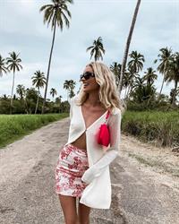 Elsa Hosk braless tits pokies in an open top.















































