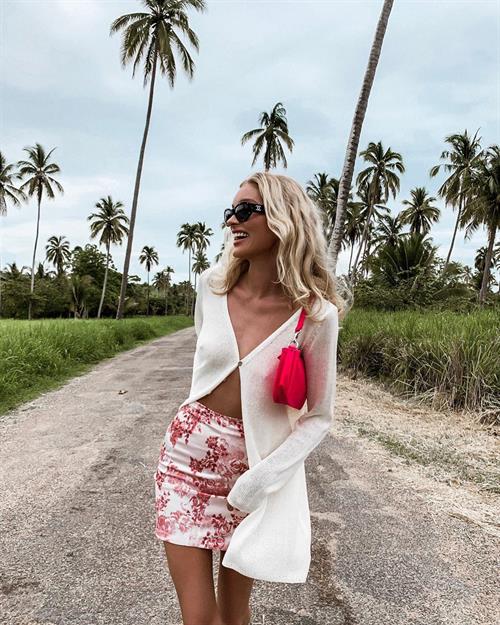 Elsa Hosk braless tits pokies in an open top.















































