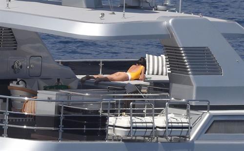 Silvia Toffanin Pictures Silvia Toffanin nipple pokies in a wet sexy swimsuit seen by paparazzi on a yacht.