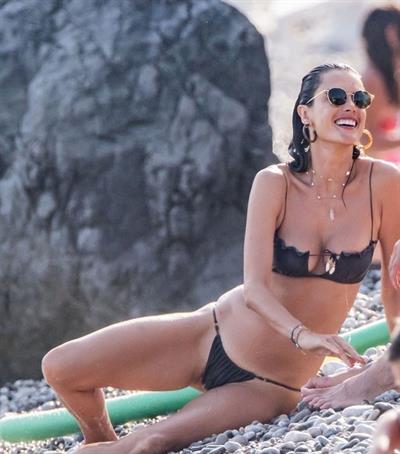 Alessandra Ambrosio sexy at the beach in a thong bikini and flashing her pussy to her boyfriend seen by paparazzi.











