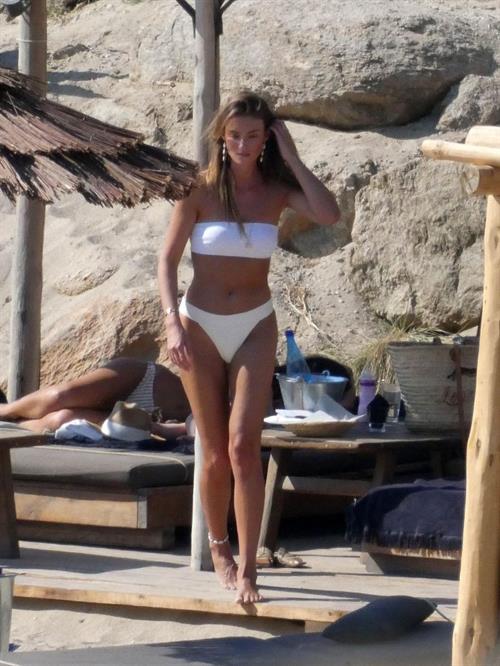 Lorena Rae Bikini Pictures Lorena Rae sexy ass in a white bikini at the beach seen by paparazzi.