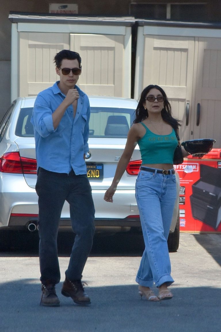 Vanessa Hudgens Pictures Vanessa Hudgens braless nipples pokies in a green top showing off her tits seen by paparazzi with Austin Butler.