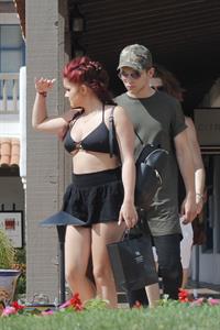 Ariel Winter paparazzi pictures in black bikini top and short skirt
