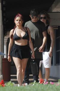 Ariel Winter paparazzi pictures in black bikini top and short skirt