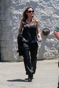 Angelina Jolie braless tits pokies in a black top seen by paparazzi showing her hard nipples.





























