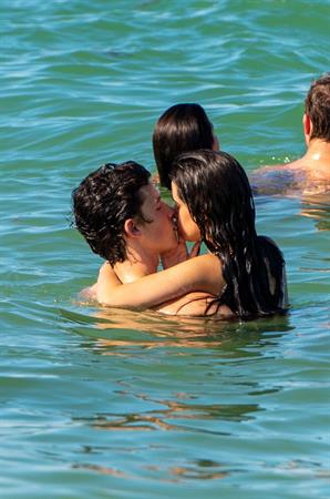 Camila Cabello and Shawn Mendes making out in the water seen kissing by paparazzi.





































