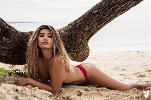 Nikki Trinidad takes off her red bikini for Playboy