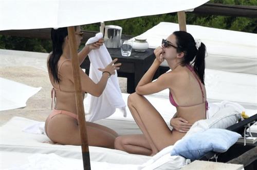 Kendall Jenner Bikini Pictures Kendall Jenner with Kourtney Kardashian sexy asses in thong bikinis seen by paparazzi.