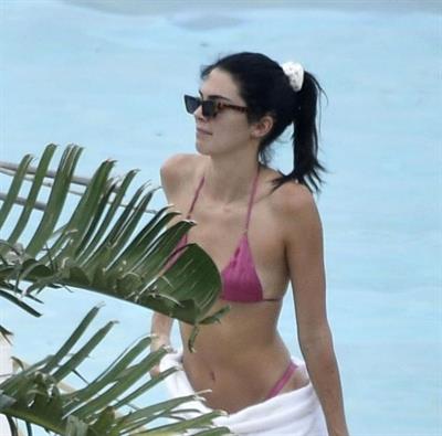 Kendall Jenner with Kourtney Kardashian sexy asses in thong bikinis seen by paparazzi.

