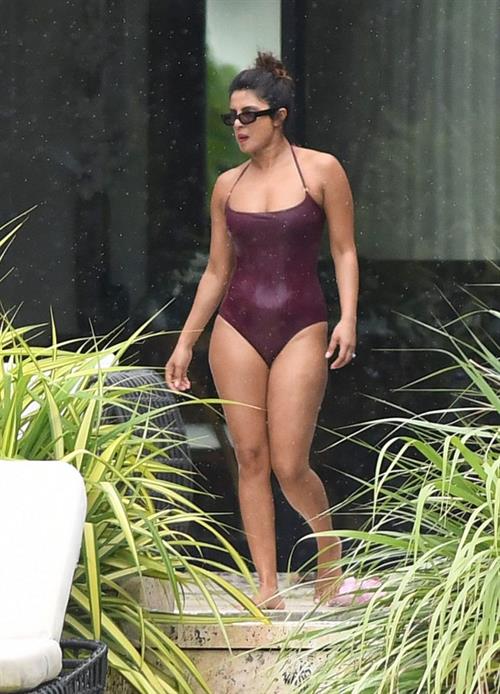 Priyanka Chopra Bikini Pictures Priyanka Chopra sexy tits in a wet swimsuit seen by paparazzi.