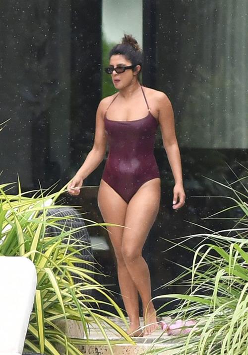 Priyanka Chopra Bikini Pictures Priyanka Chopra sexy tits in a wet swimsuit seen by paparazzi.
