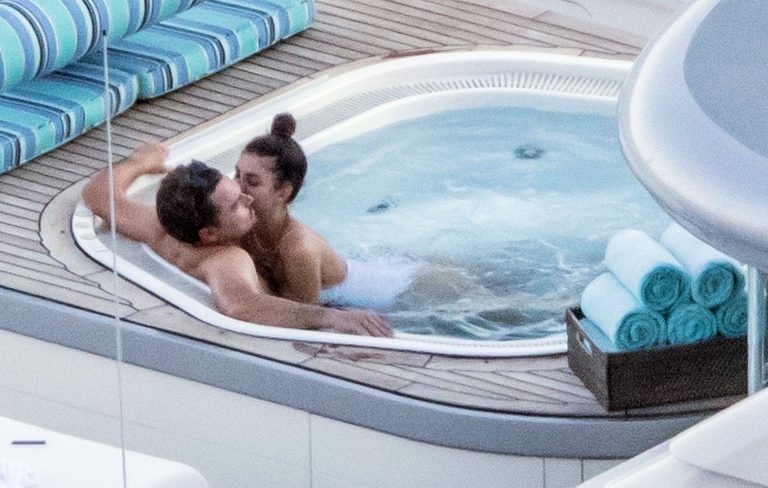 Camila Morrone Bikini Pictures Camila Morrone in a sexy swimsuit in a hot tub on a yacht with Leonardo DiCaprio seen by paparazzi.