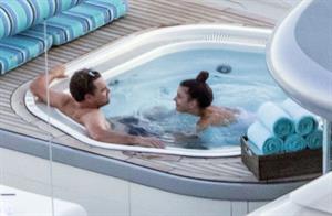 Camila Morrone in a sexy swimsuit in a hot tub on a yacht with Leonardo DiCaprio seen by paparazzi.










