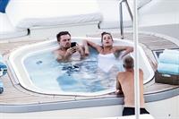 Camila Morrone in a sexy swimsuit in a hot tub on a yacht with Leonardo DiCaprio seen by paparazzi.










