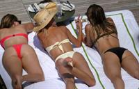 Miley Cyrus and Kaitlynn Carter making out kissing by the pool seen by paparazzi showing her lesbian side after leaving Liam Hemsworth.




