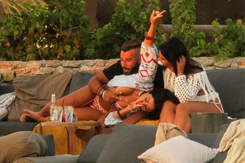 Martha Kalifatidis Bikini Pictures Martha Kalifatidis sexy in a bikini showing her ass and nice cleavage seen by paparazzi.