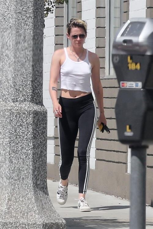 Kristen Stewart Pictures Kristen Stewart braless tits pokies seen by paparazzi in a white top showing off her boobs.