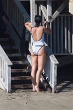 Dua Lipa sexy ass and cleavage in a swimsuit at the beach seen with her boyfriend by paparazzi.













