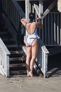 Dua Lipa sexy ass and cleavage in a swimsuit at the beach seen with her boyfriend by paparazzi.













