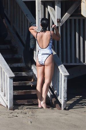 Dua Lipa sexy ass and cleavage in a swimsuit at the beach seen with her boyfriend by paparazzi.













