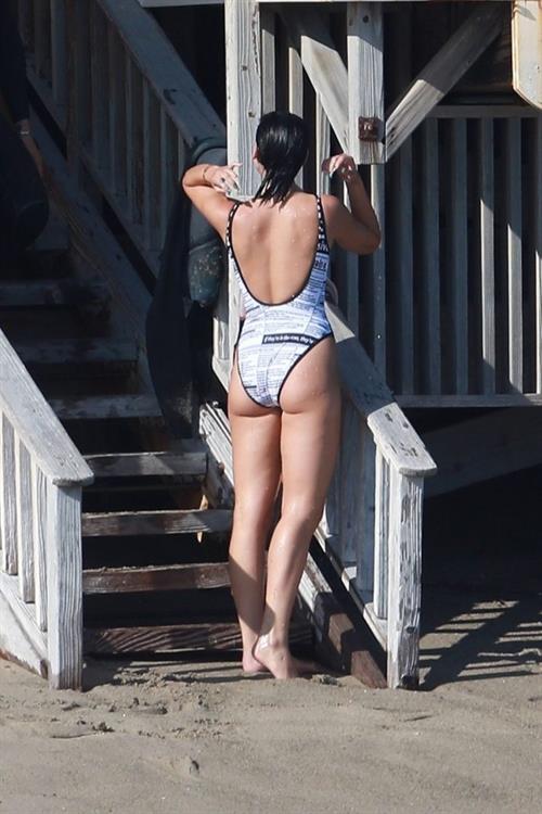 Dua Lipa sexy ass and cleavage in a swimsuit at the beach seen with her boyfriend by paparazzi.













