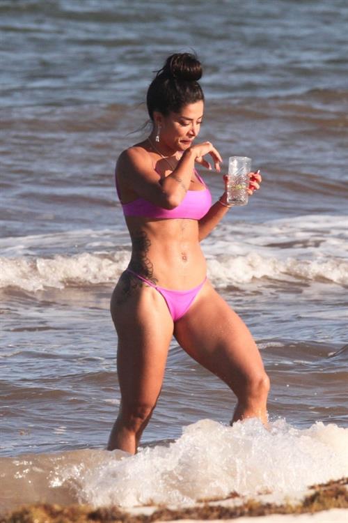 Aline Riscado Bikini Pictures Aline Riscado seen at the beach by paparazzi in a sexy ass thong bikini showing nice cleavage.
