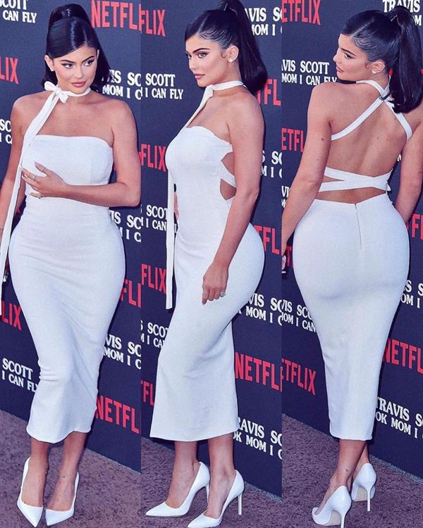 Kylie Jenner sexy ass in a tight white dress with Travis Scott at the premiere of  Look Mom I Can Fly .





































