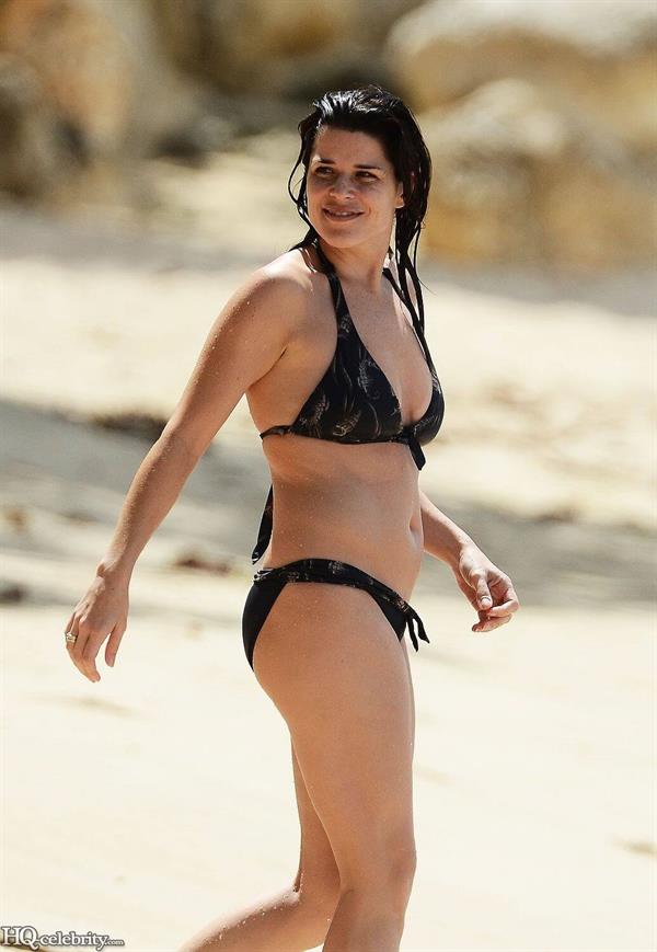 Neve Campbell in a bikini