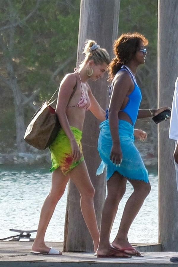 Hailey Bieber, Kendall Jenner and Justine Skye sexy bikini and swimsuit photos seen on a boat drinking for Hailey Bieber's bachelorette party.
