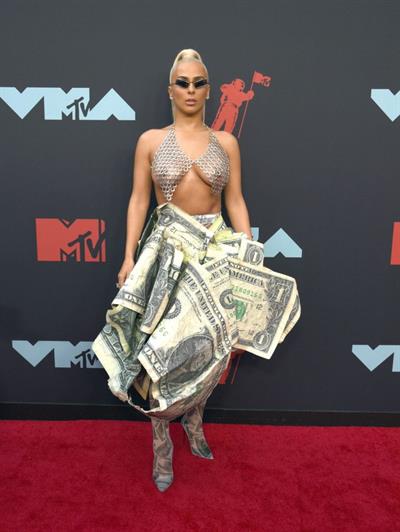 Veronica Vega showing off her braless boobs on the red carpet at the MTV VMA's in a see through top.















